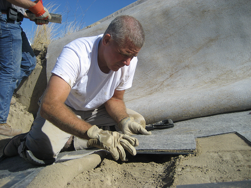 Benson working in the field