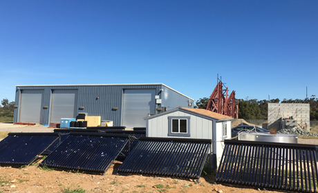 photo of solar thermal panels on the ground