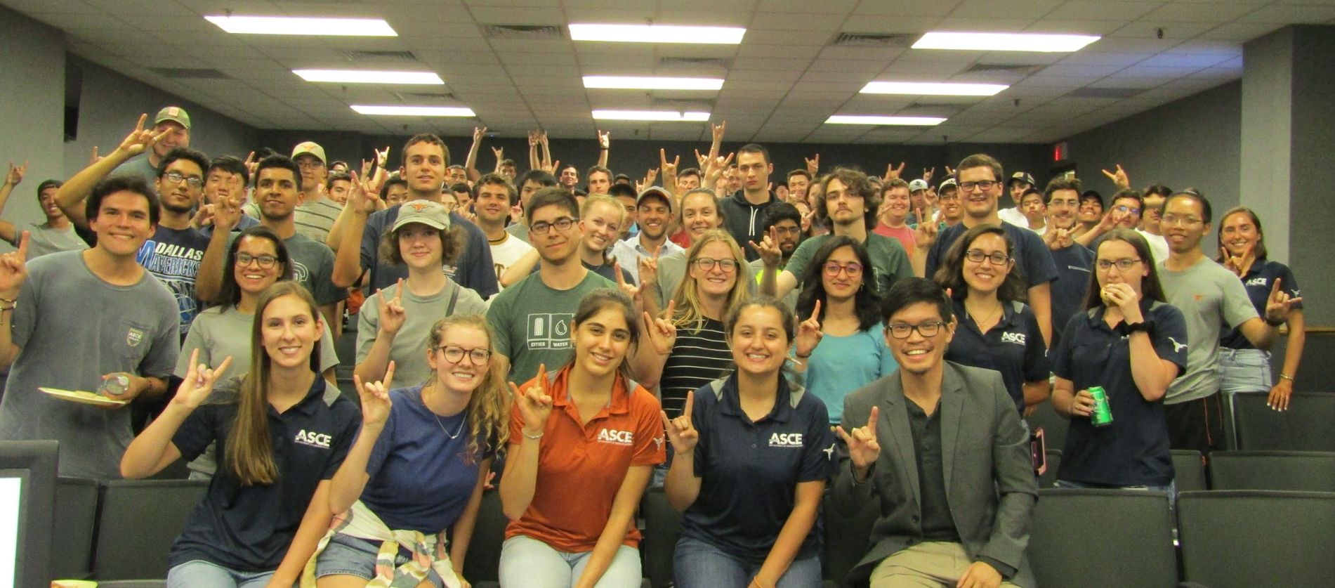 group of people standing for photo