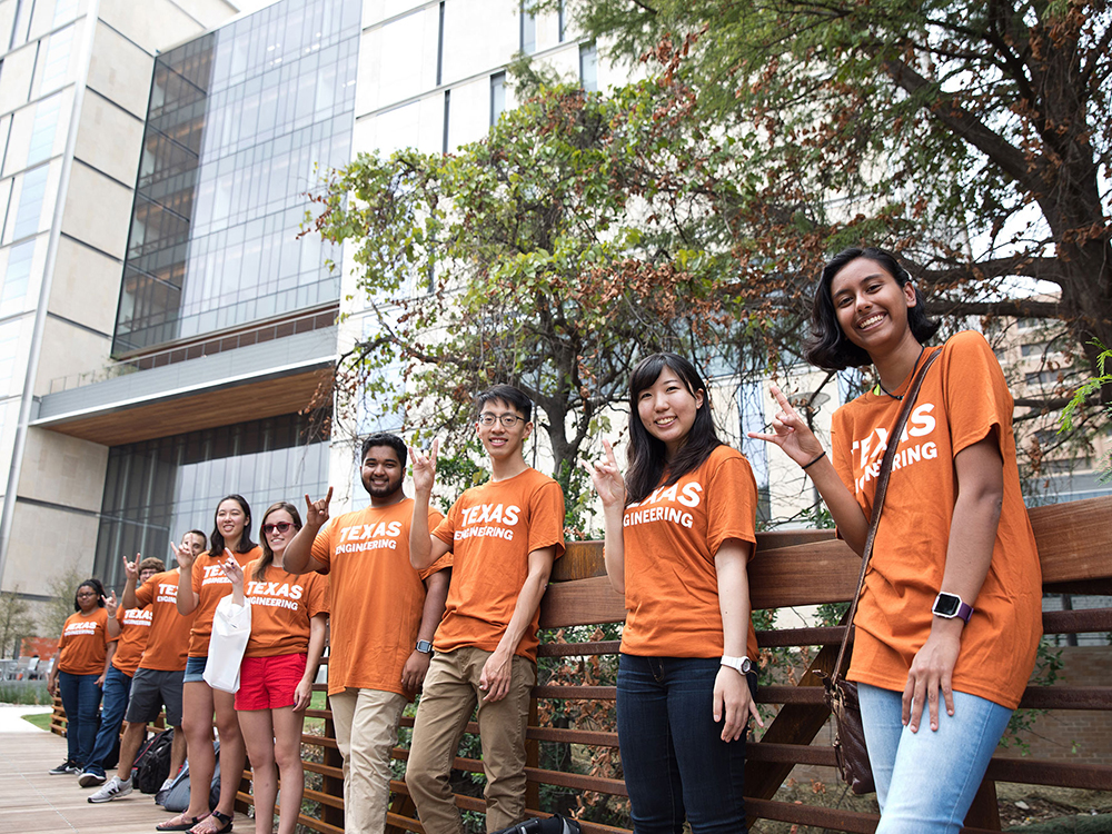 students standing in front of EER building